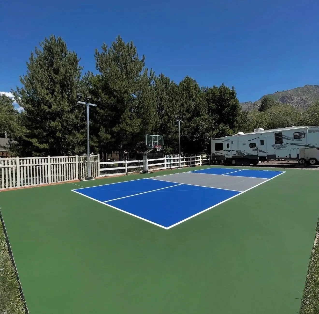 Backyard multicourt with blue and light blue color combination