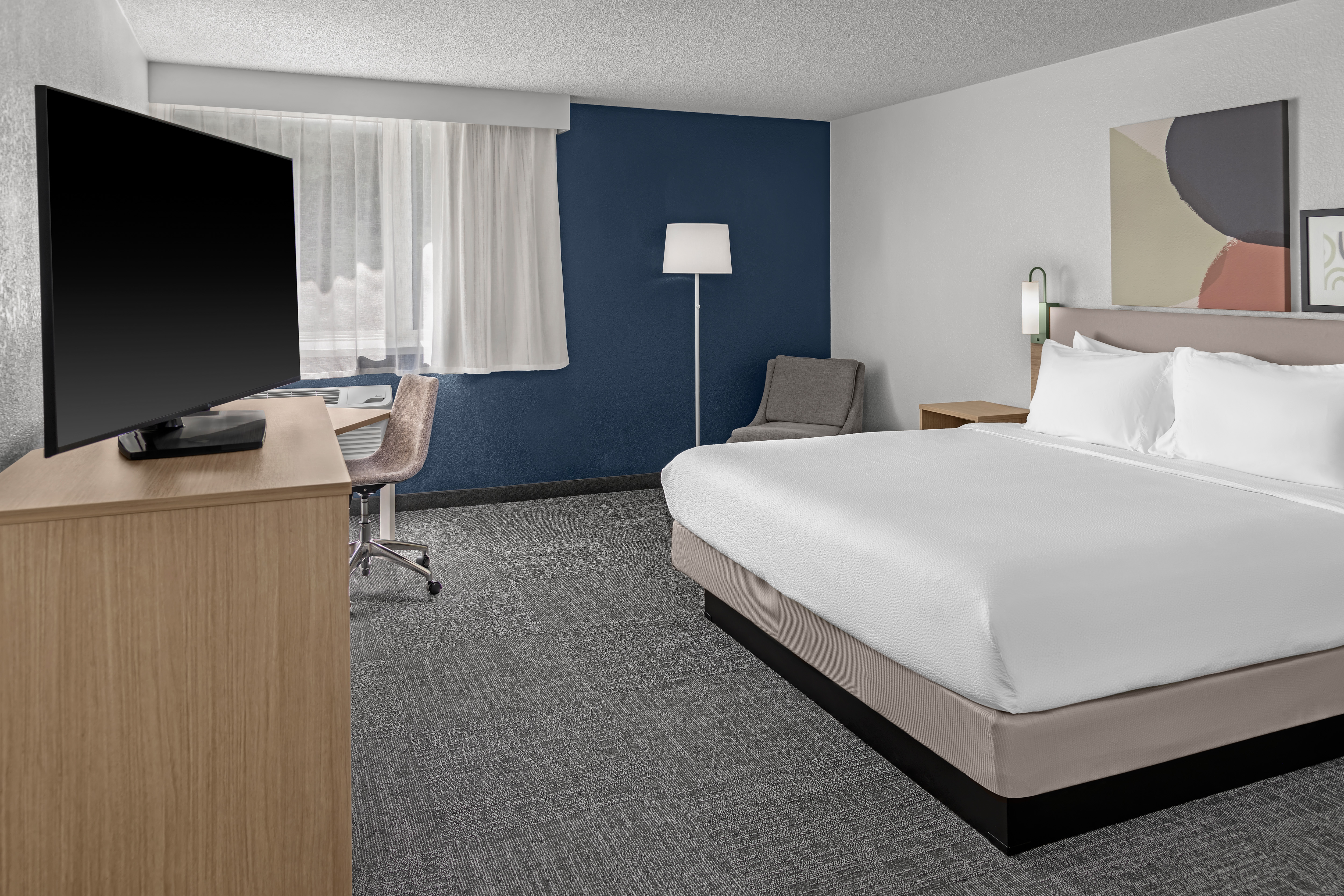 Guest room at Spark by Hilton Kansas City Plaza Streetcar