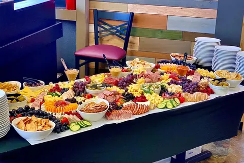 A Main Event catered spread set up in the Club Room