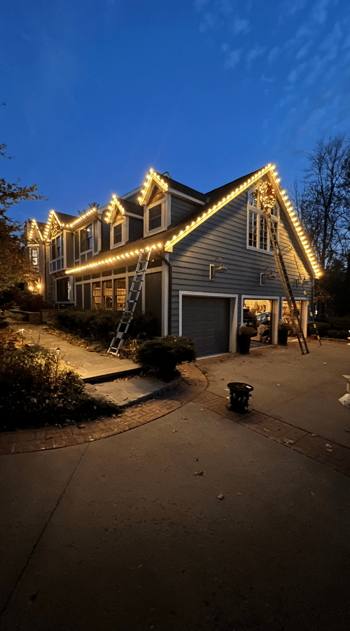 Commercial Christmas lighting installation on business storefront by Golden Glow Christmas Lights