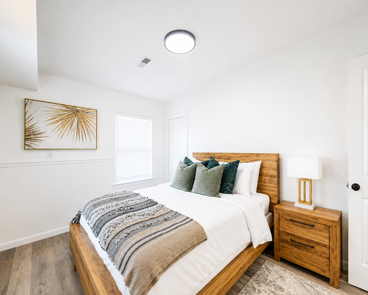 Luxury farmhouse-style master bedroom