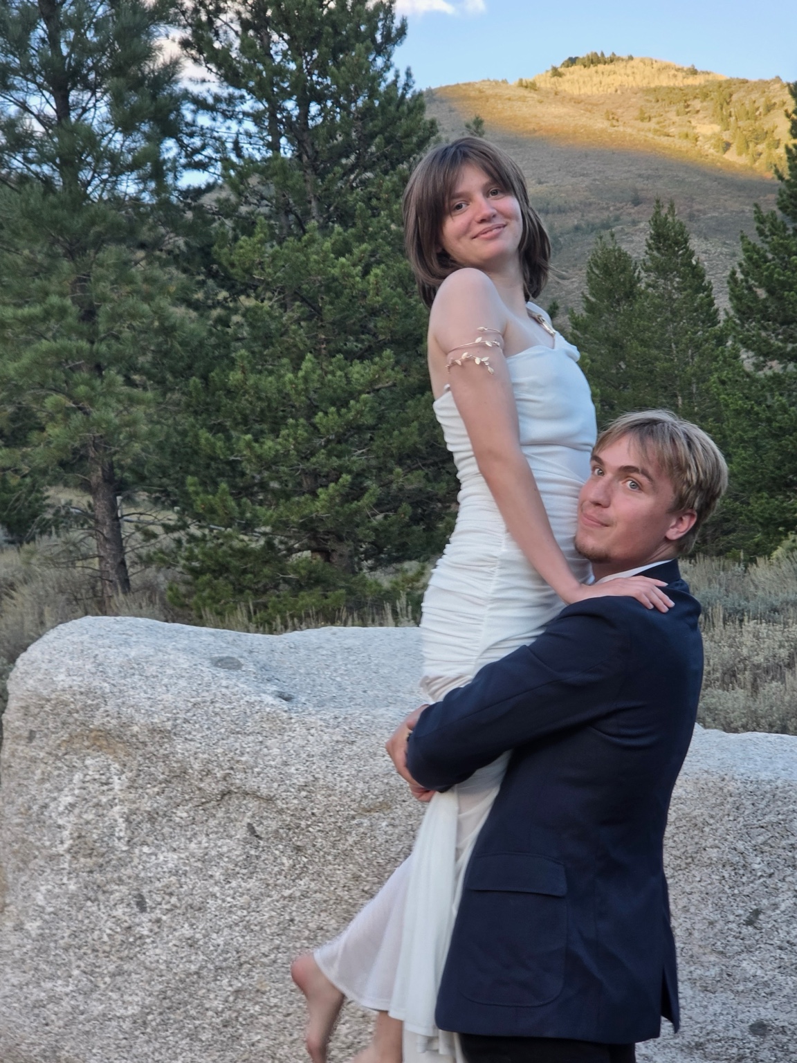 Andrew holding Brook in the mountains