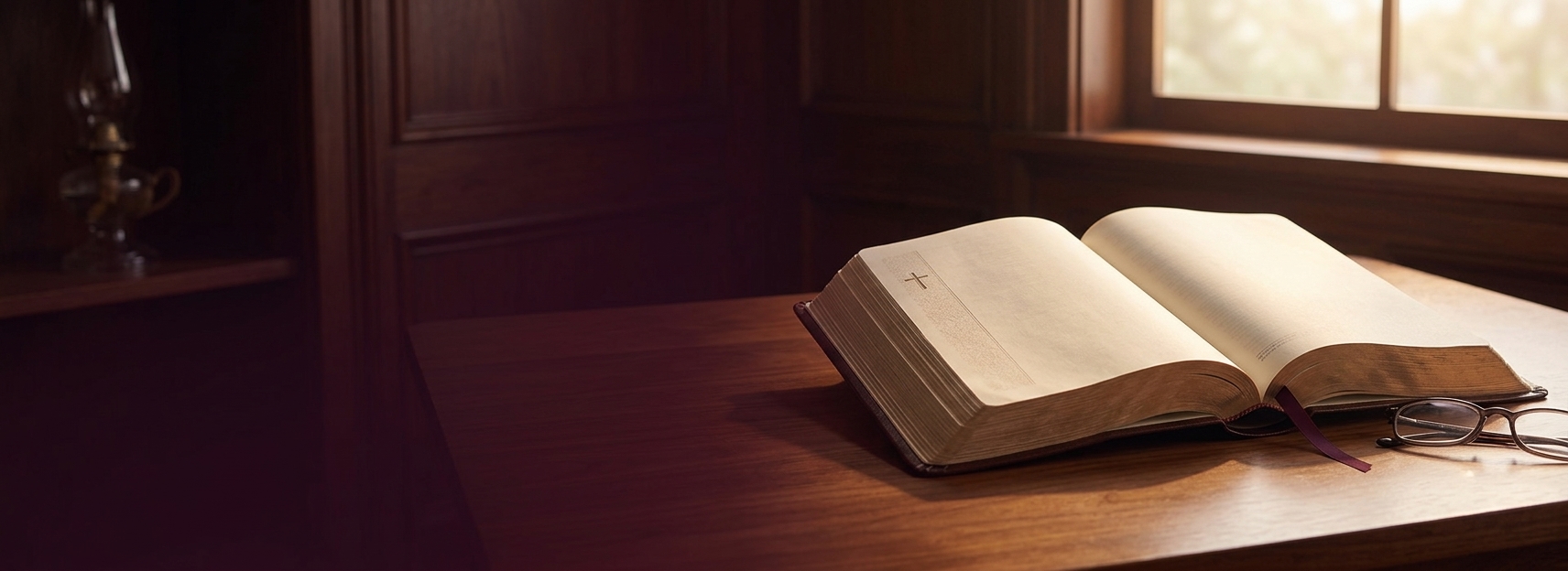 An open Bible in warm morning light
