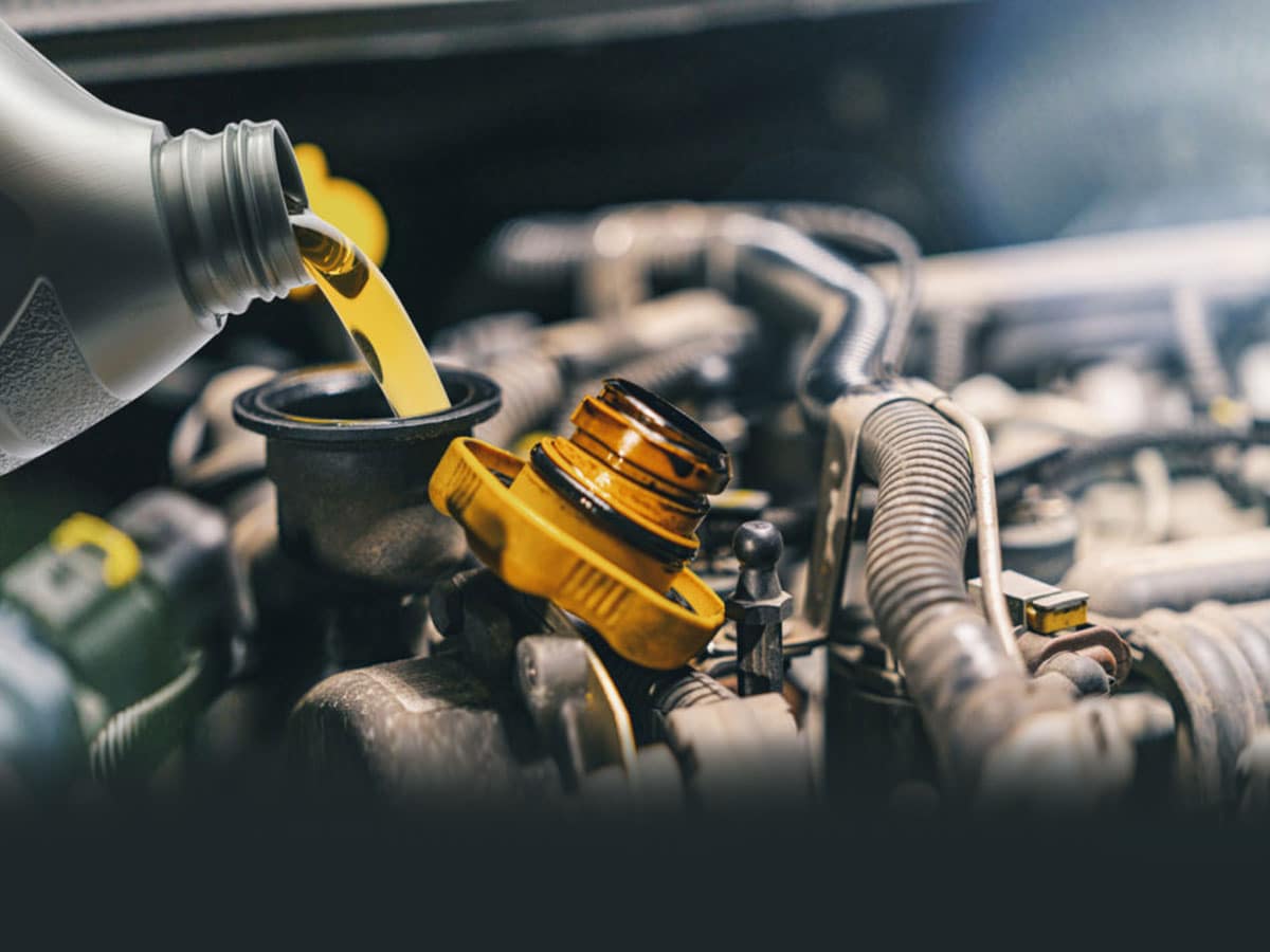 adding fresh oil to a vehicle engine adding fresh oil to a vehicle engine
