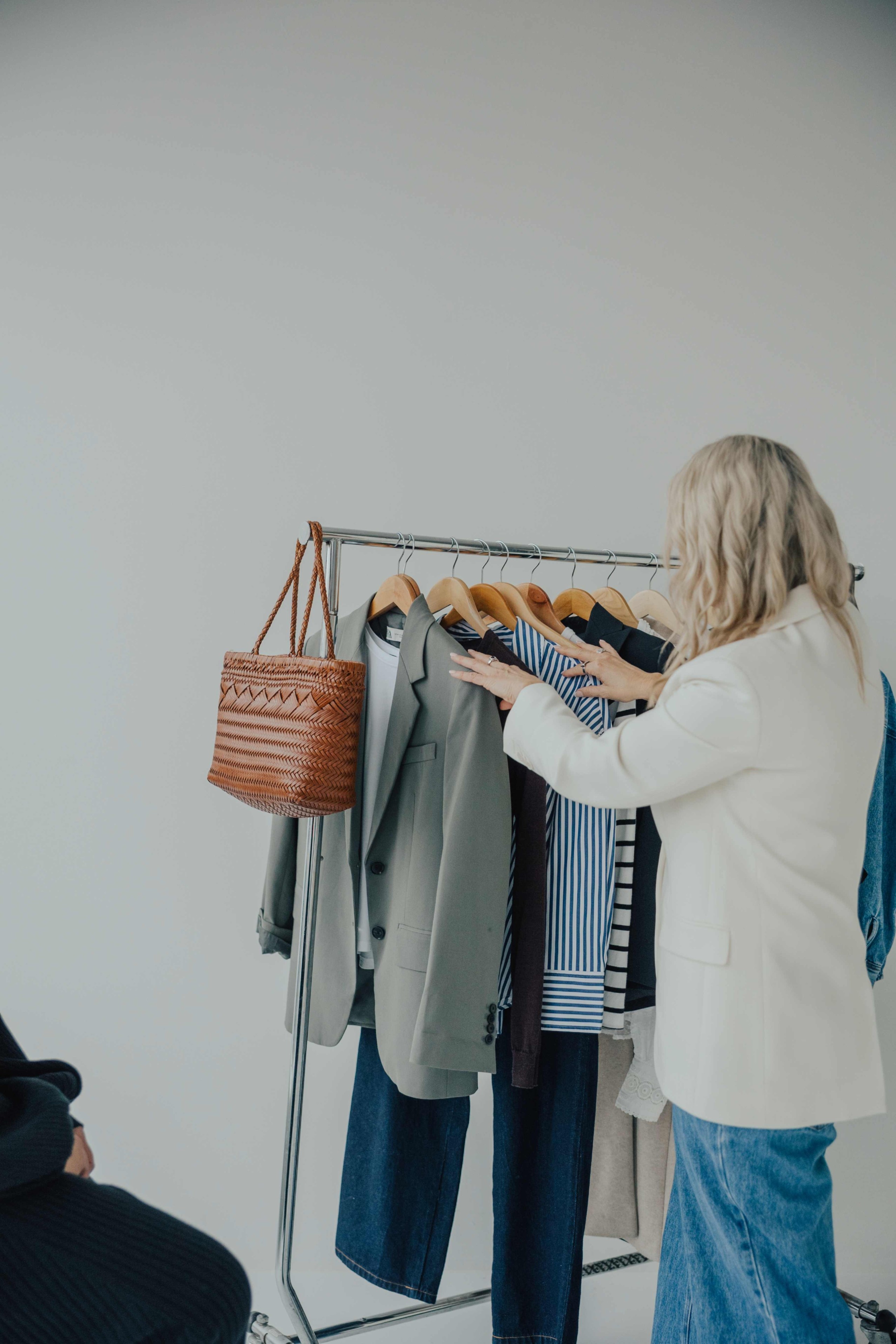 Melissa Armitage Auckland personal stylist selecting outfits during personal shopping session