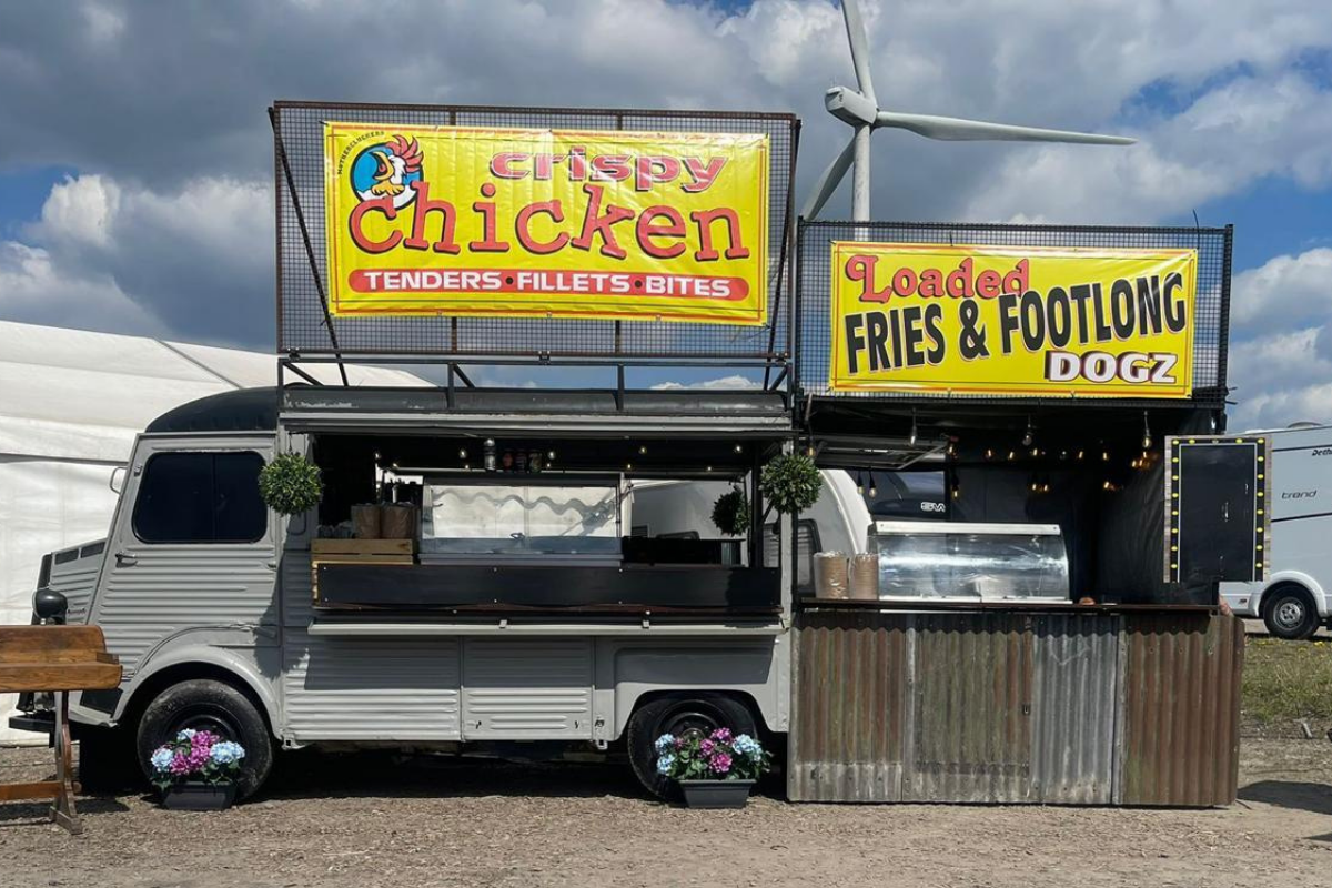 retro vehilce serving crispy chicken