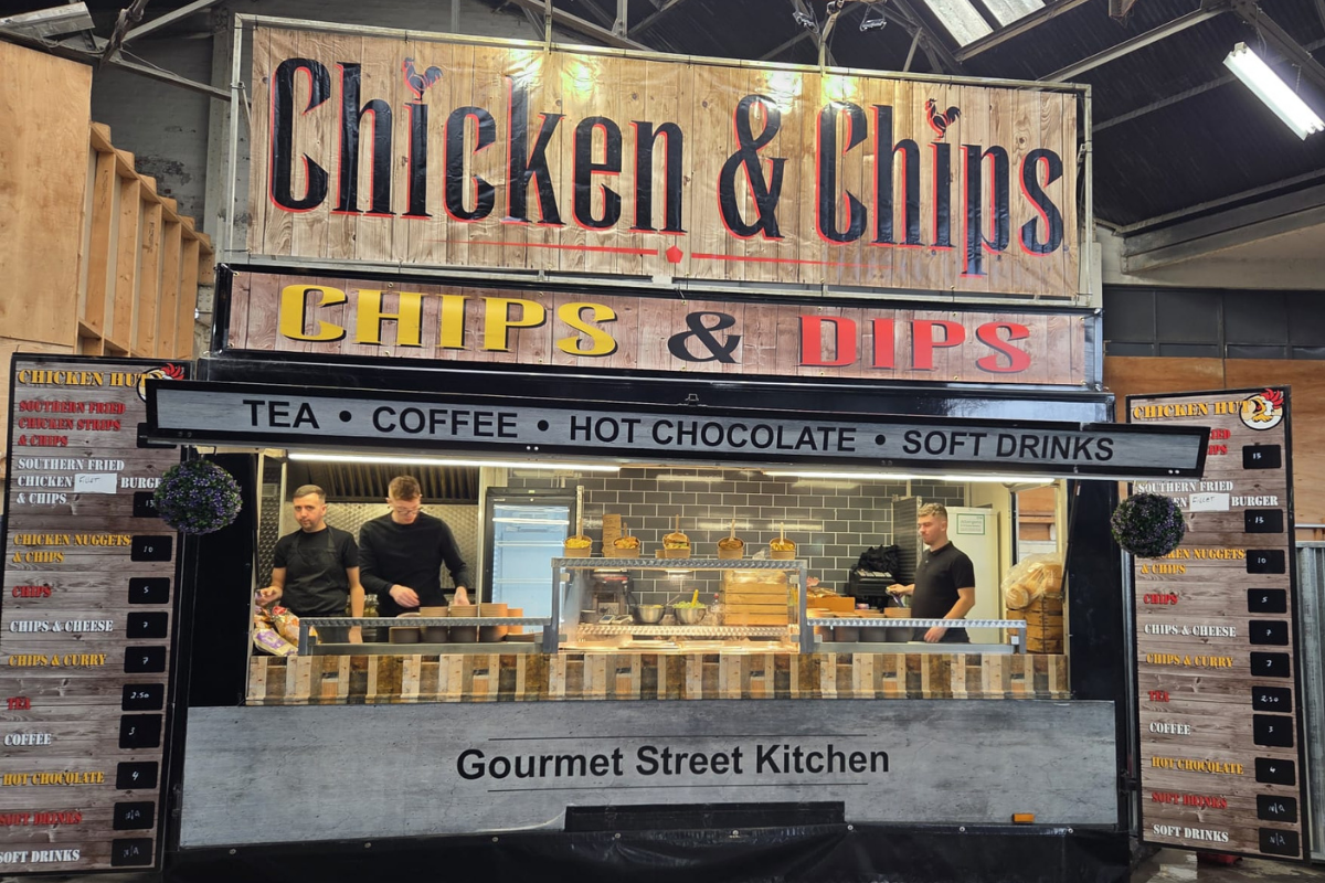 Street food stall serving chicken & chips