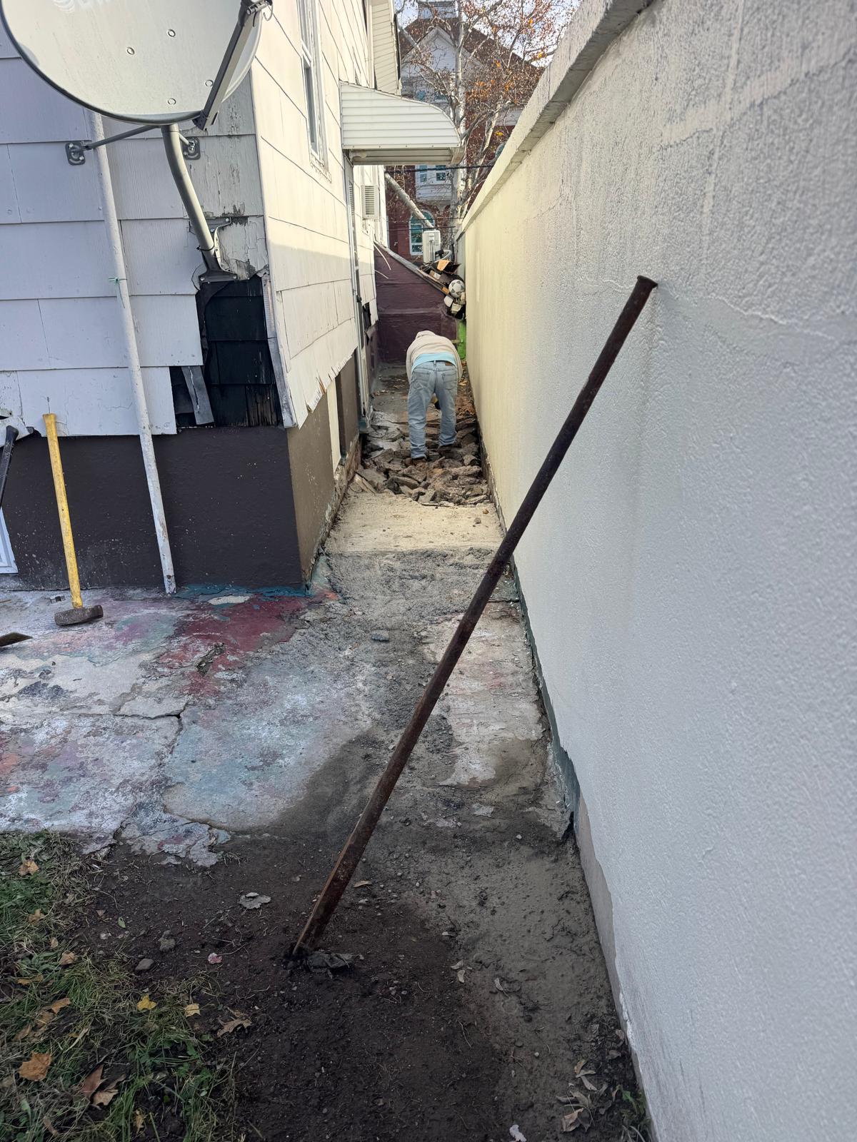 Concrete pouring and finishing for side walkway in Essex County NJ
