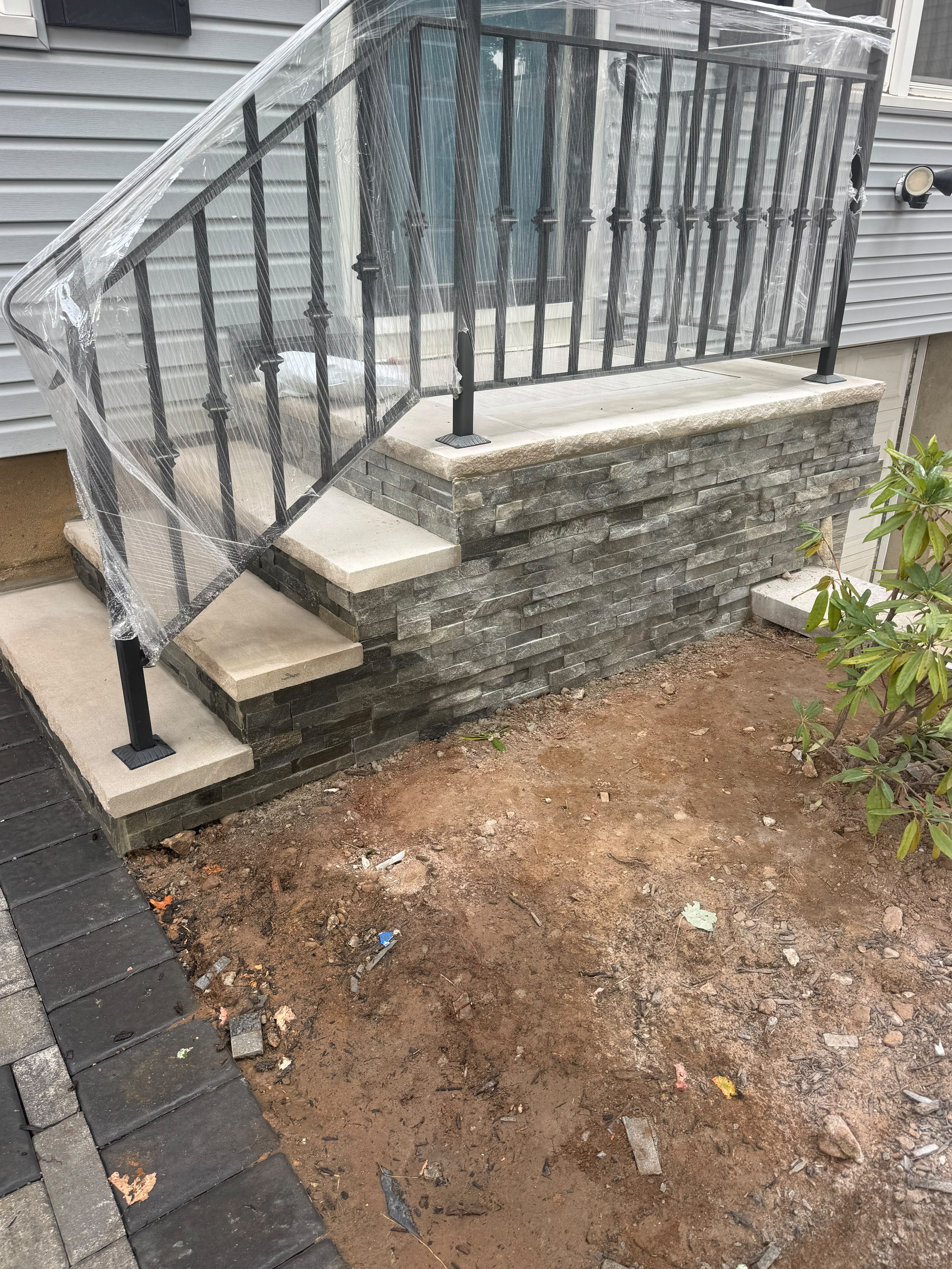 Front entry masonry step construction in Bloomfield New Jersey