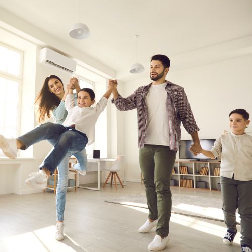 Happy family enjoying a spotless home after maid cleaning 