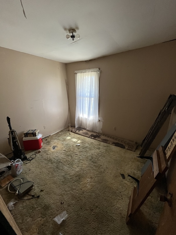 Room before renovation at 105 White Oak
