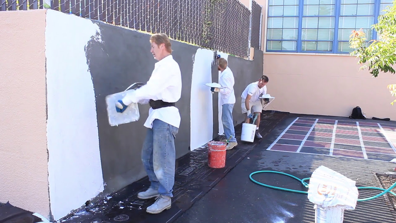 Stucco base coat application