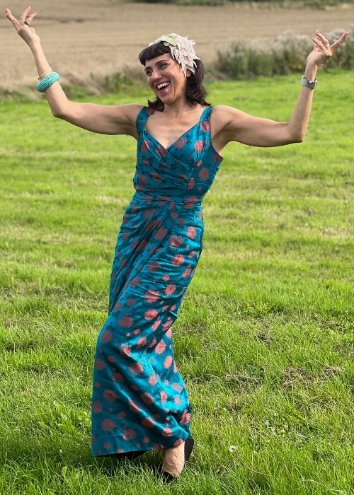 Vegan Susy wearing a party dress