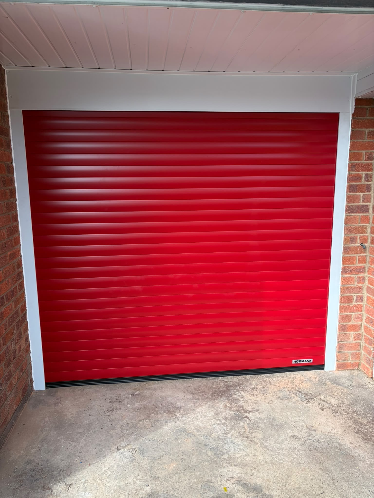 Red roller garage door Amblecote