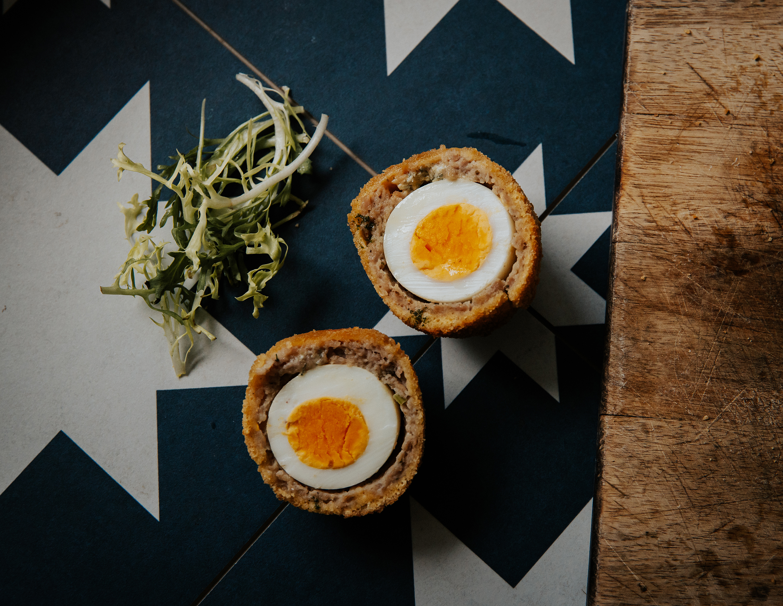 A scotch egg cut in half A scotch egg cut in half