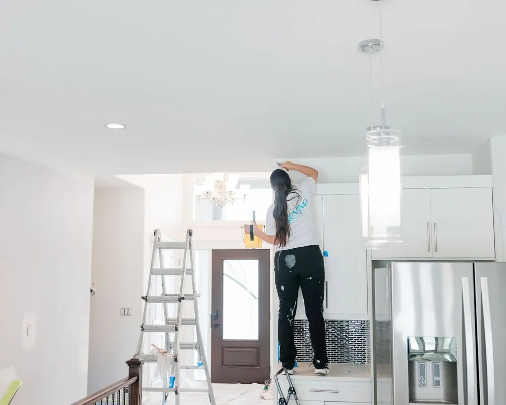 Painting a home in Saskatoon