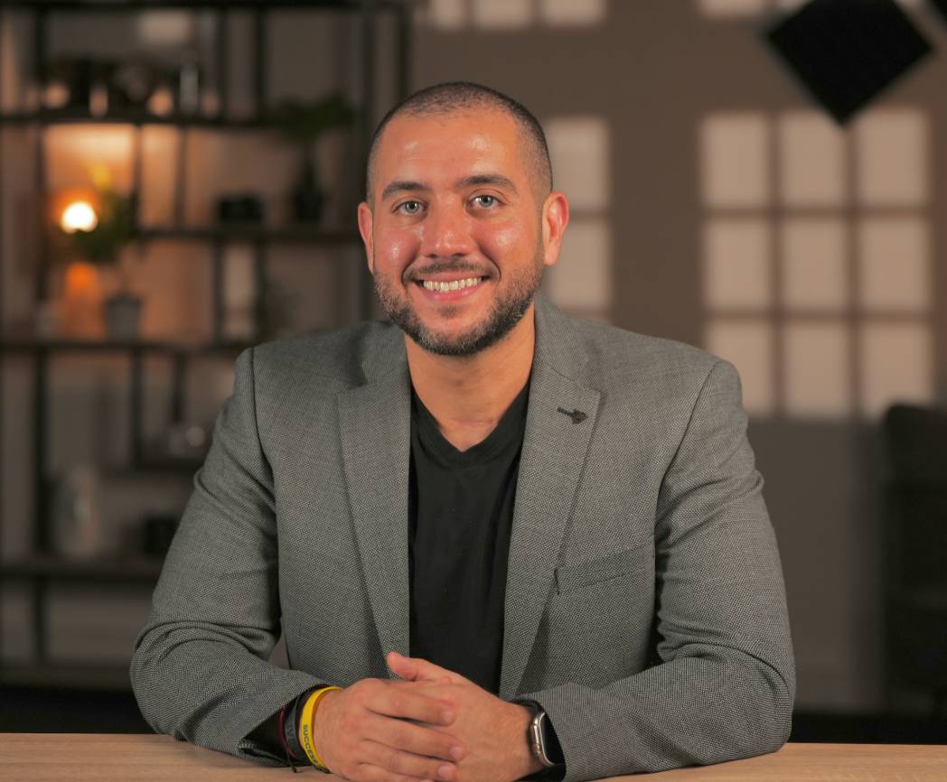 Anthony Rizk, life coach and creator of The Unbreakable Code, speaking at an event