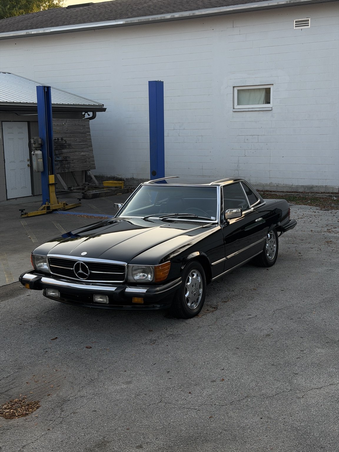 Black classic coupe at the detailing shop