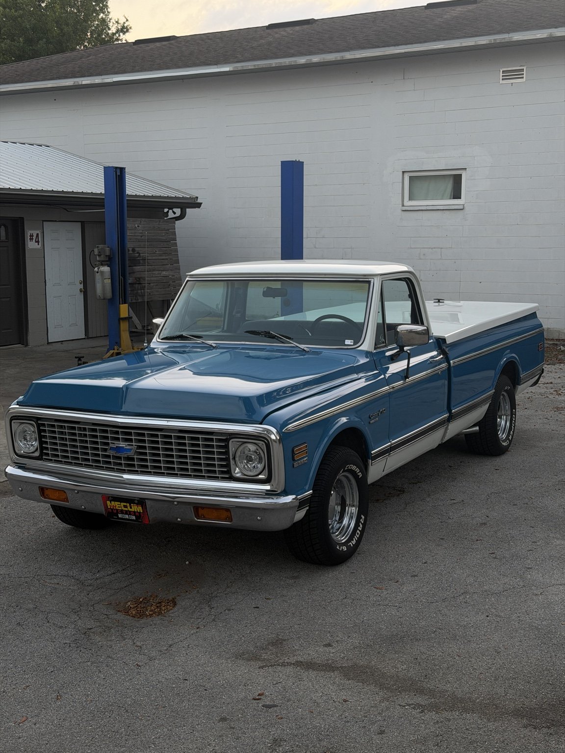 Blue classic truck at the detailing shop