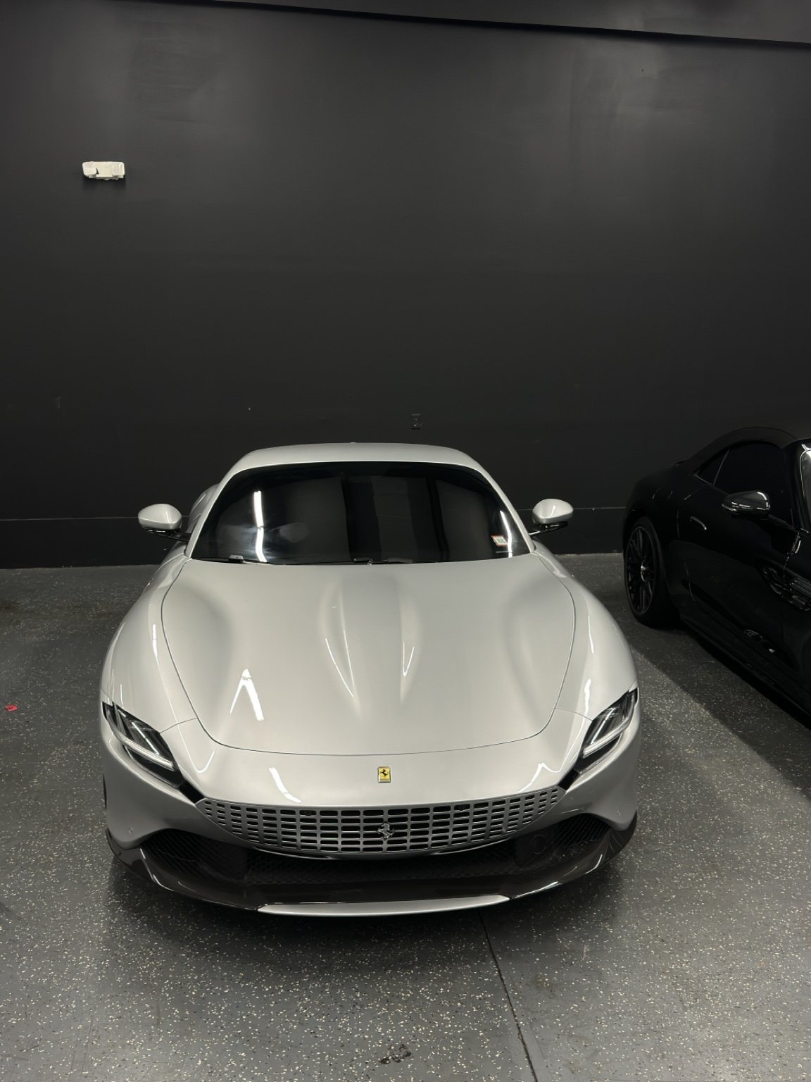 White sports car in a studio