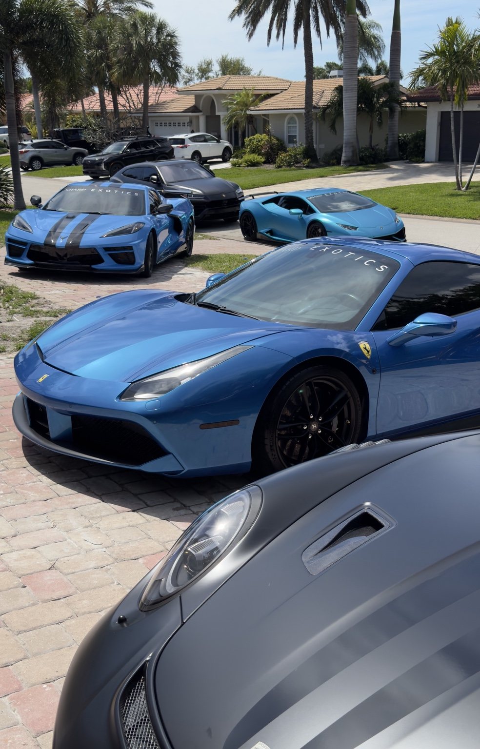 Blue supercars at a Lakeland detail appointment