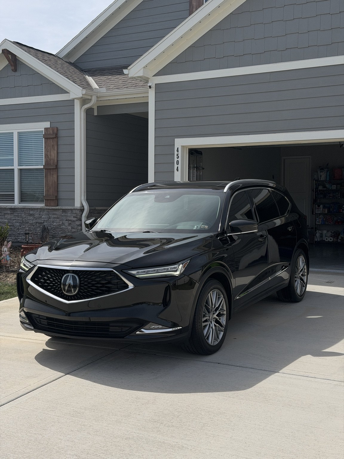 Black Acura SUV at a residential detail appointment