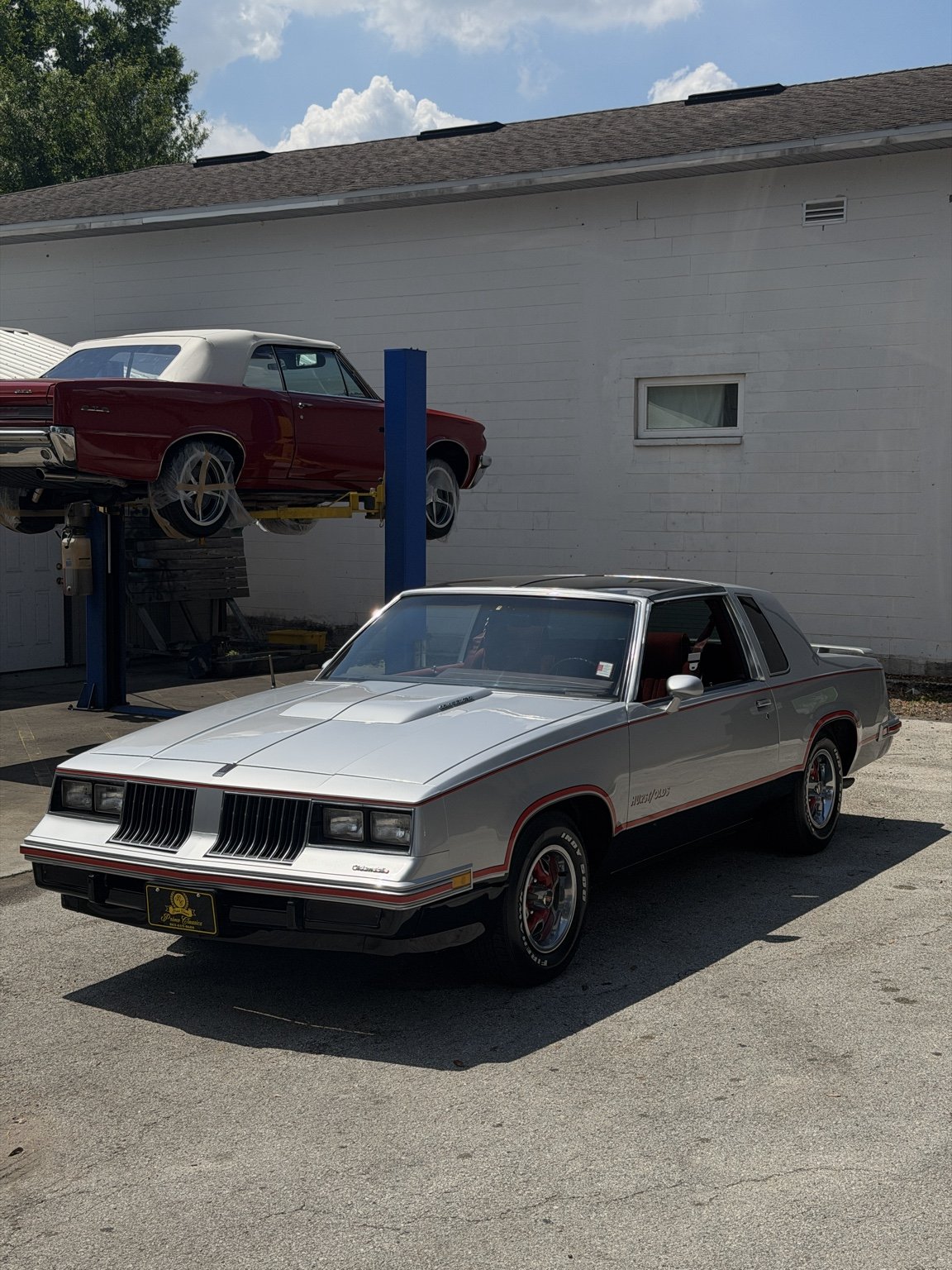 Silver classic car at the detailing shop