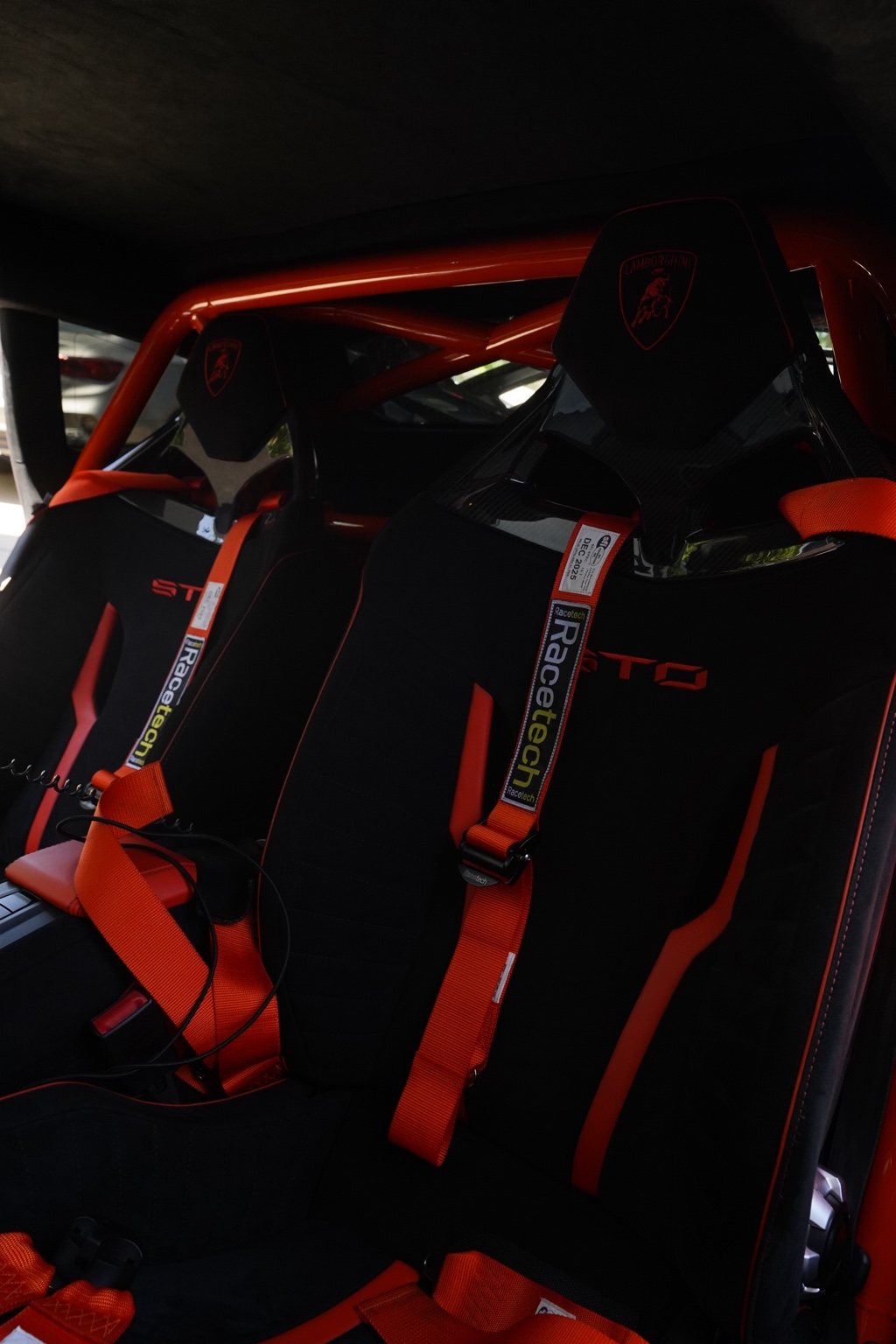 Lamborghini interior with orange accents