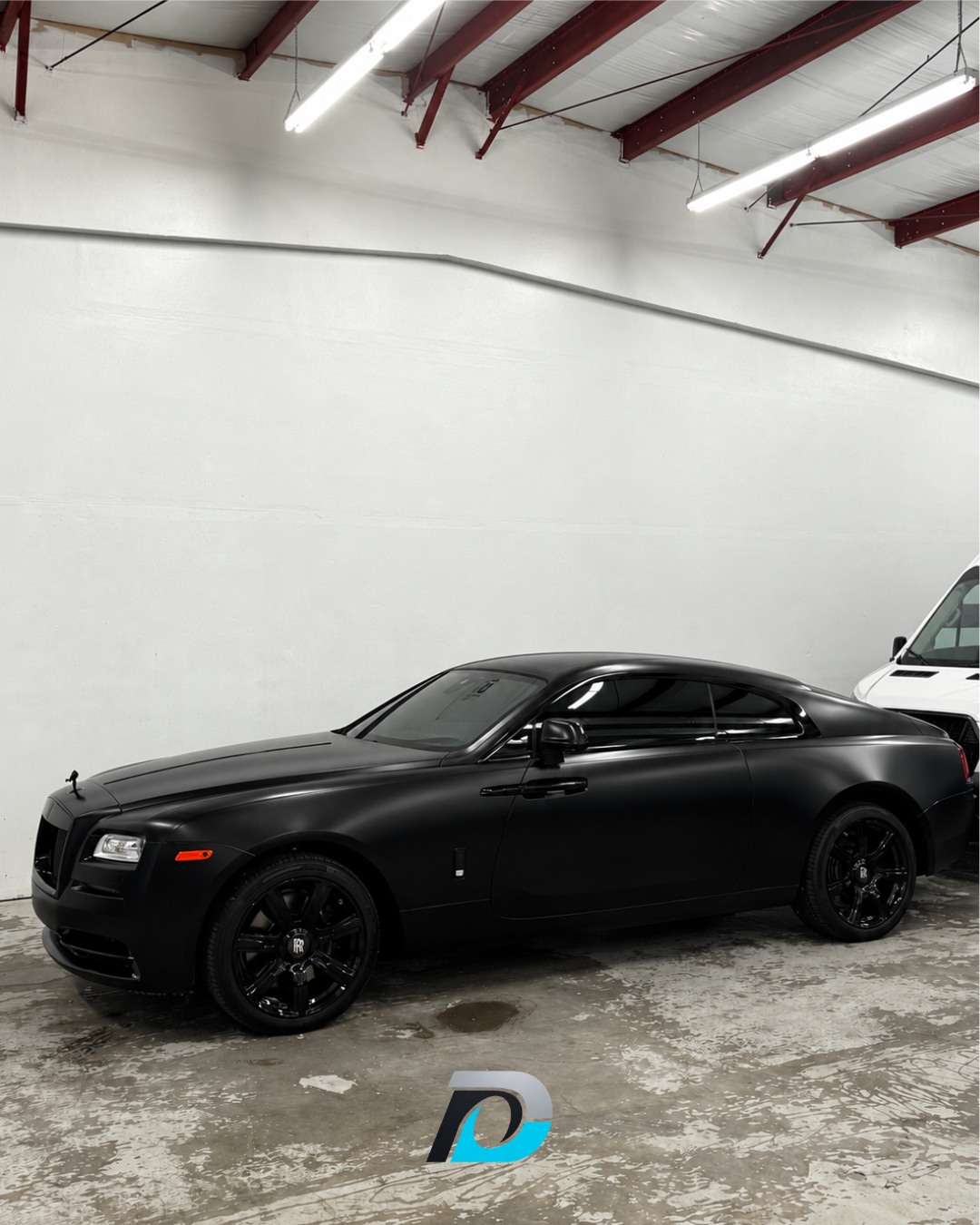 Rolls-Royce with a full-body stealth wrap completed by ONYX Detail Studios