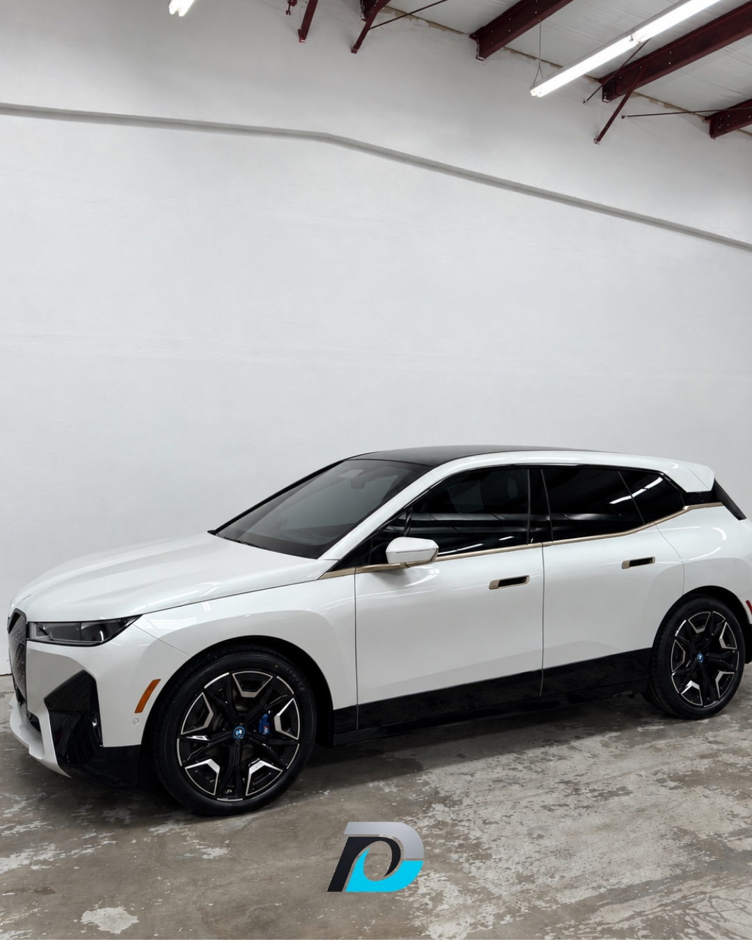 White BMW iX with full-body clear PPF and ceramic coating completed by ONYX Detail Studios