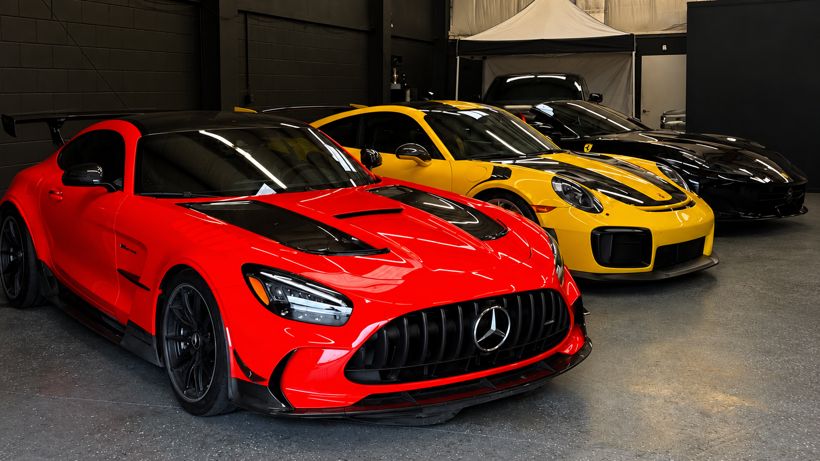 Exotic cars outside the ONYX detail studio