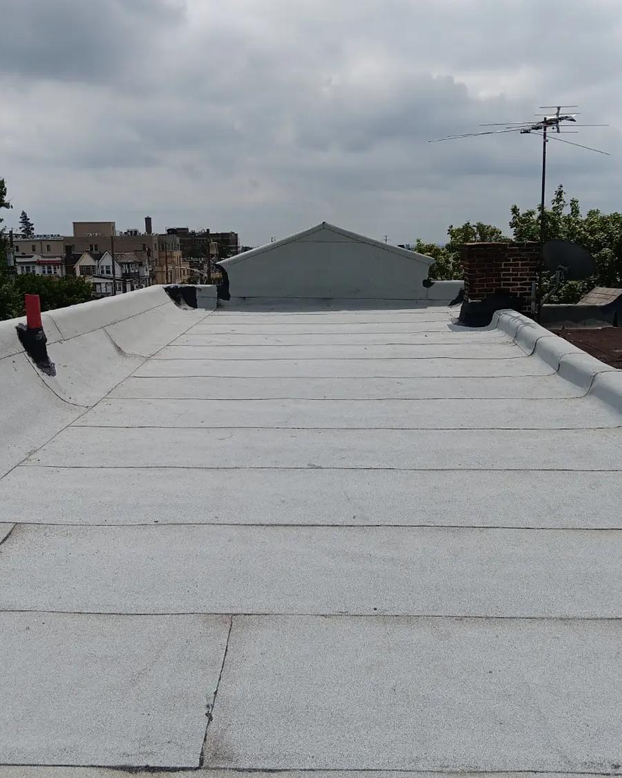 The same roof after black and silver coating, sealed edge to edge