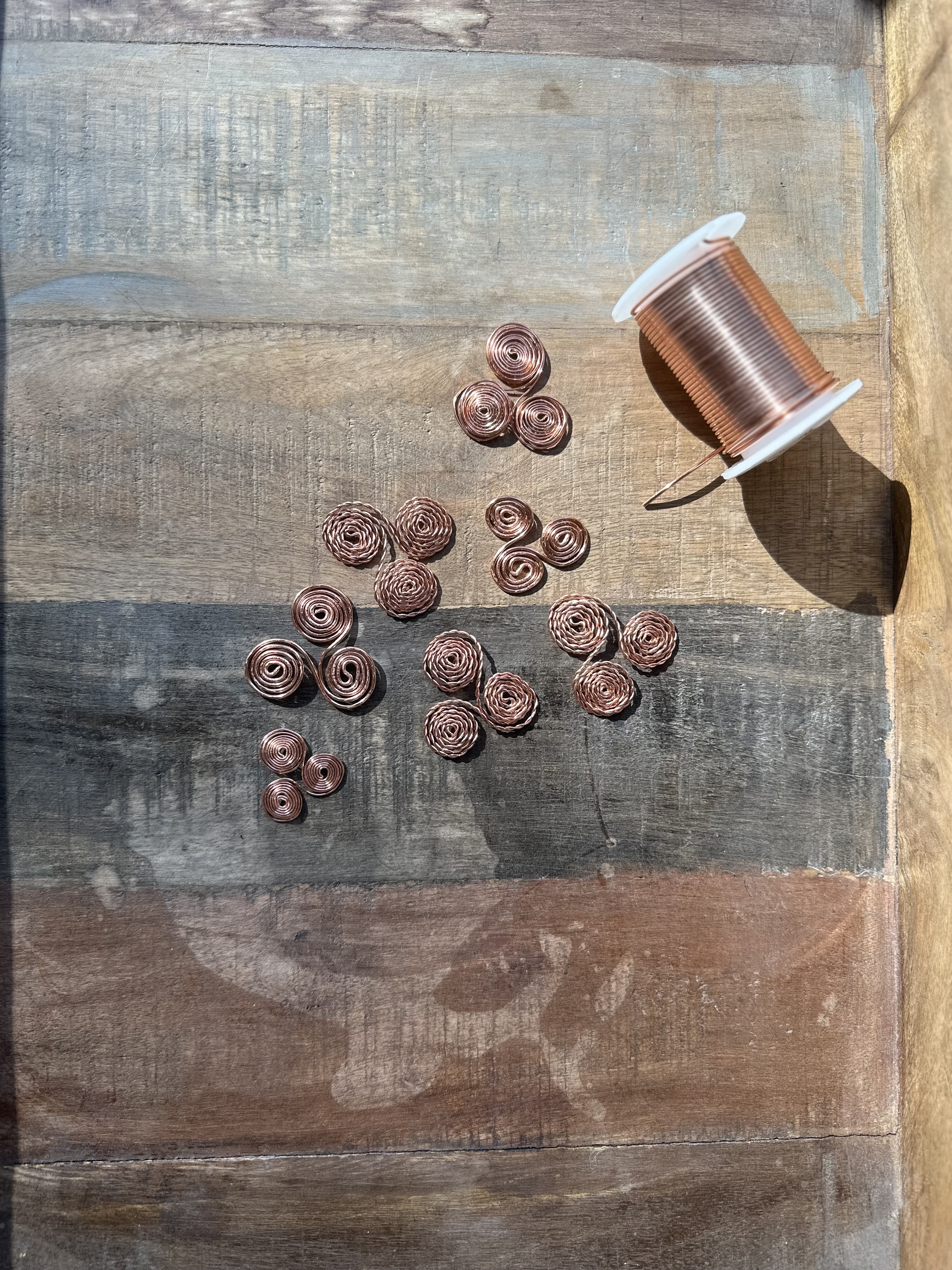 Copper triskelion, front view