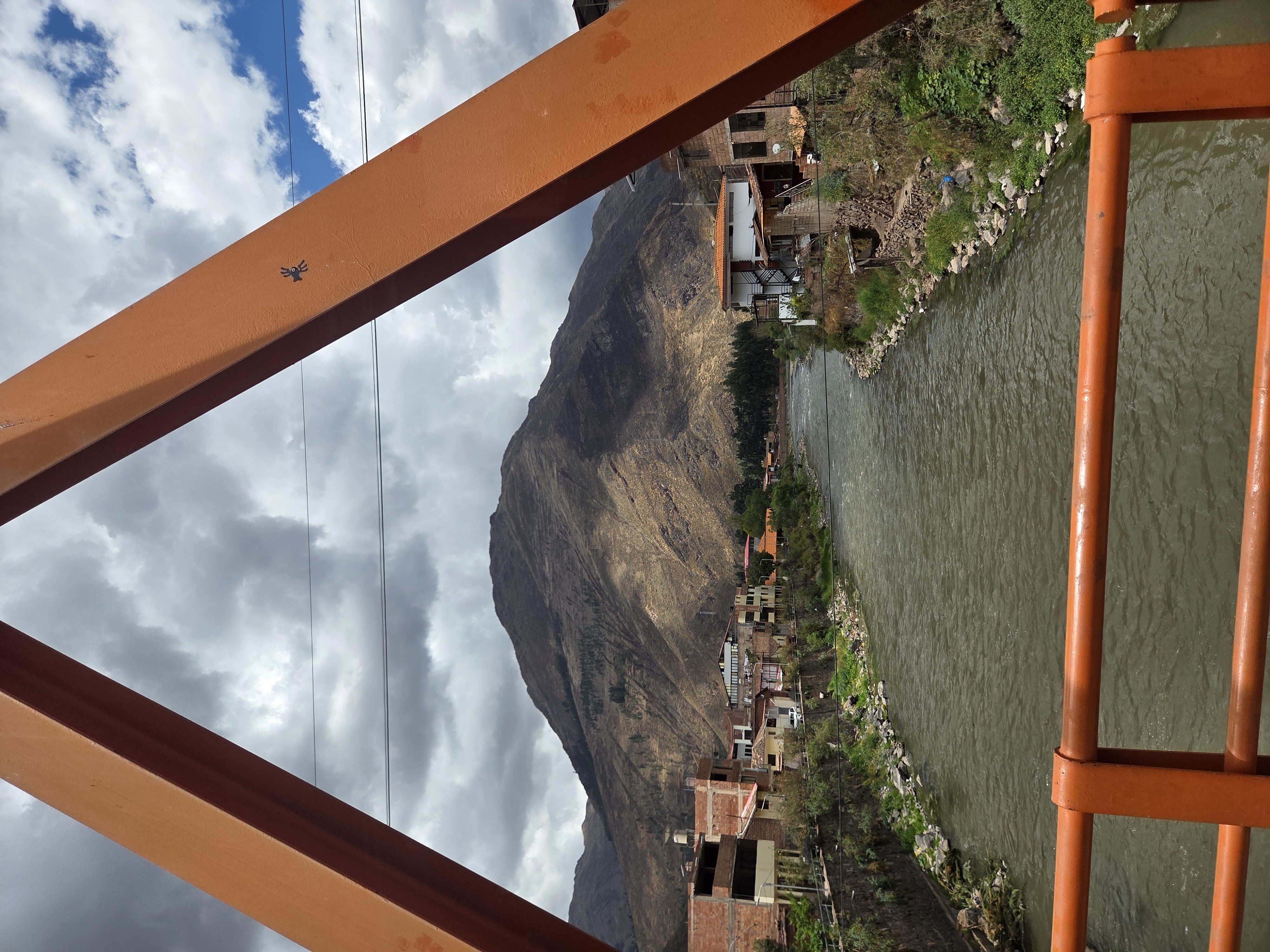 Crossing the bridge — Sacred Valley, Peru
