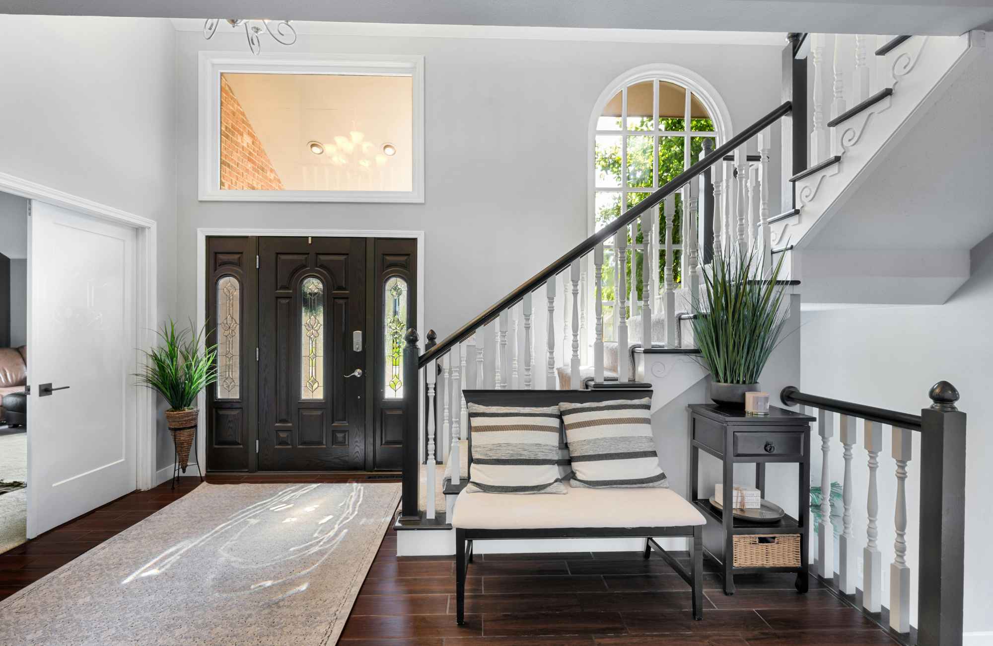 professional-home-organizer-el-segundo-ca-organization-consultation-home-entryway-with-bench-and-table-stairs-light-walls-dark-wood-elevated professional-home-organizer-el-segundo-ca-organization-consultation-home-entryway-with-bench-and-table-stairs-light-walls-dark-wood-elevated