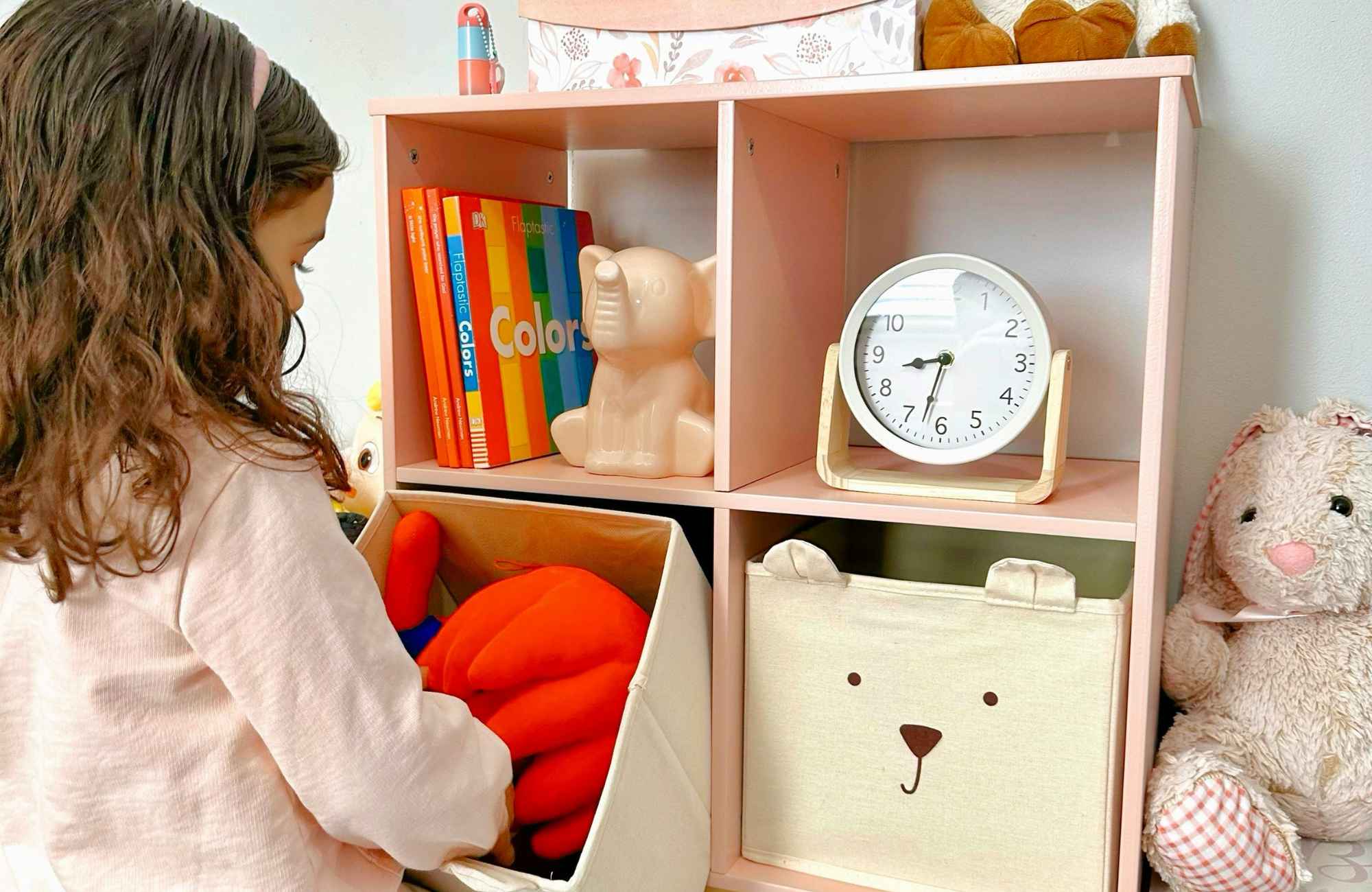 professional-home-organizer-hawthorne-ca-organizing-kids-rooms-little-girl-putting-toys-back-into-bins-in-playroom-elevated-home-transformation professional-home-organizer-hawthorne-ca-organizing-kids-rooms-little-girl-putting-toys-back-into-bins-in-playroom-elevated-home-transformation