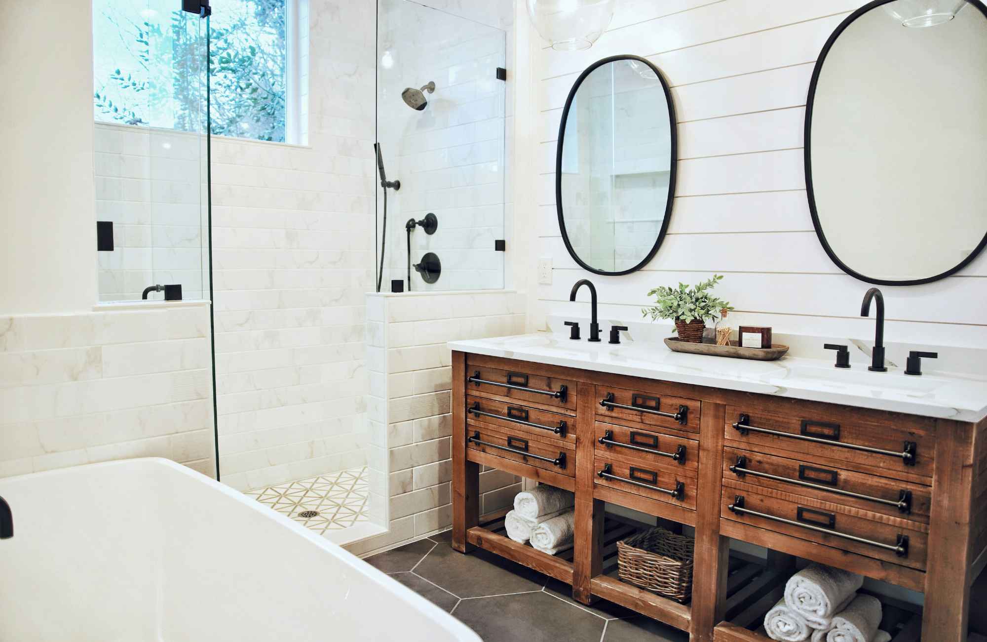 professional-home-organizer-redondo-beach-ca-need-to-hire-professional-organizer-tidy-bathroom-double-vanity-glass-shower-oval-mirrors-functional