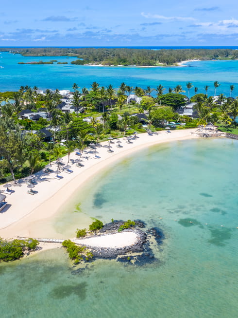 Four Seasons luxury beach destination with turquoise lagoon