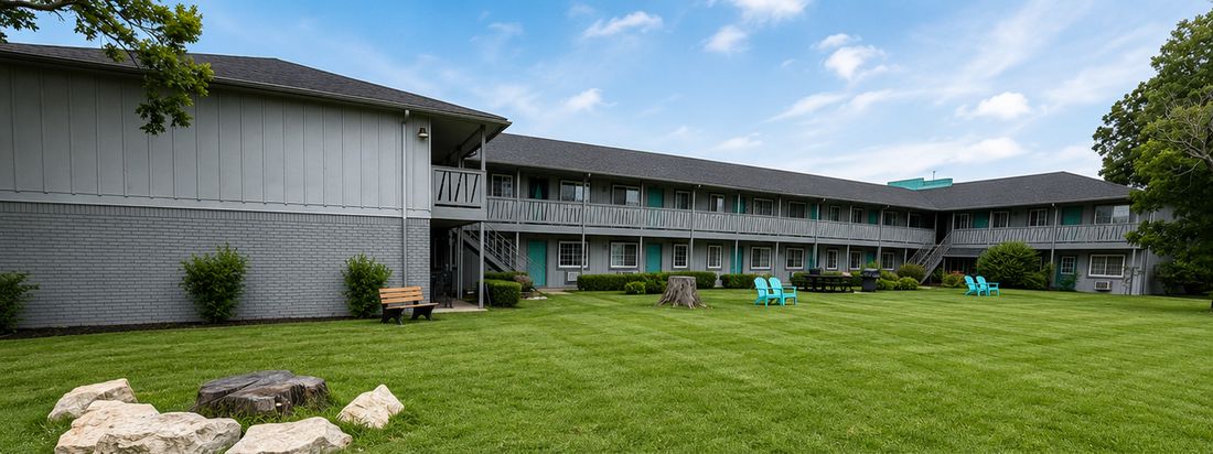 Hideaway Cove courtyard and two-story apartment buildings