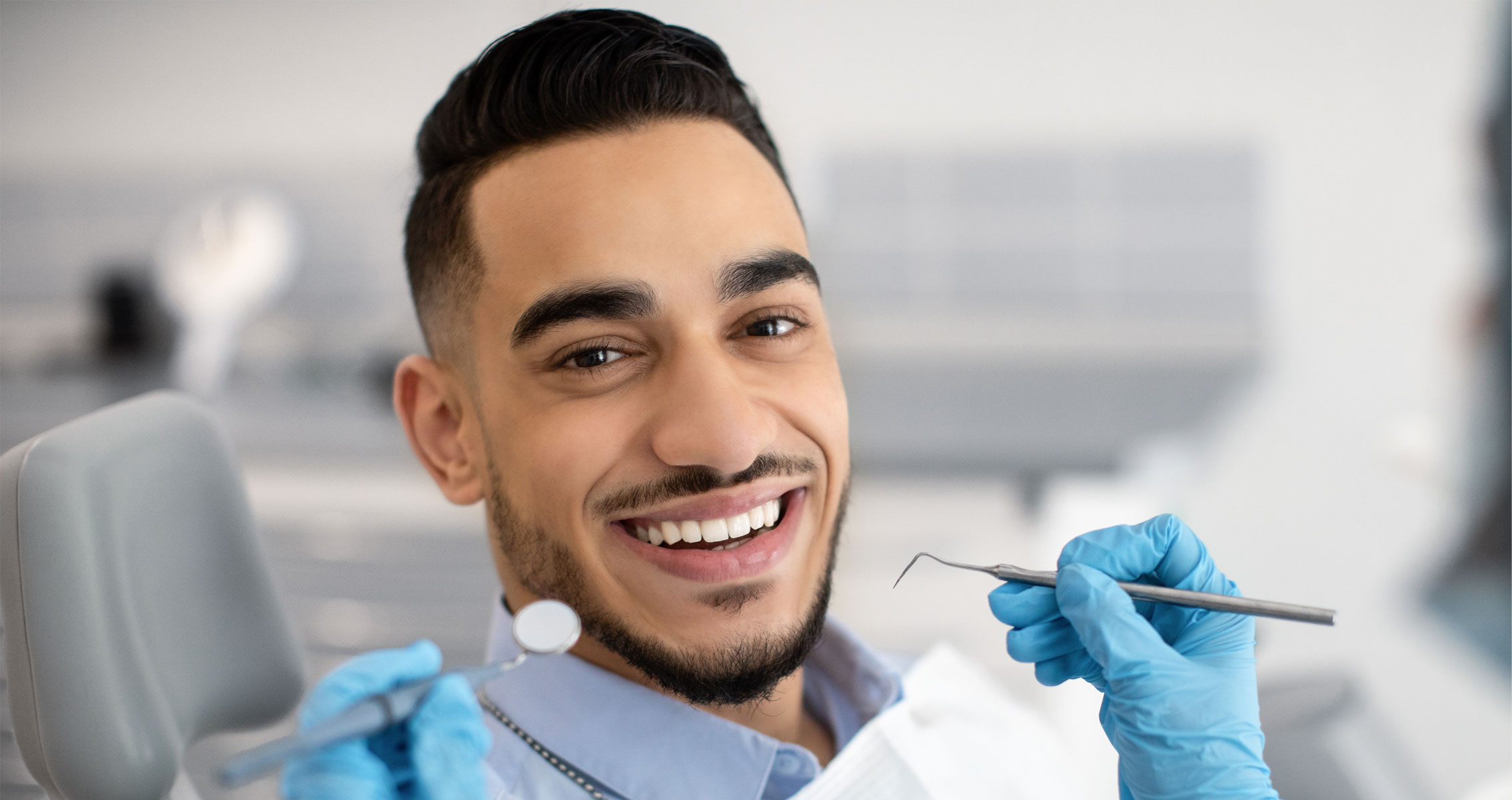 Man holding a tooth brush