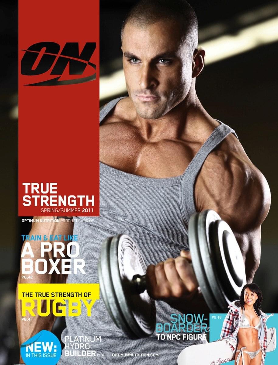 On True Strength magazine cover from 2011 featuring Tobias Young holding a dumbbell.