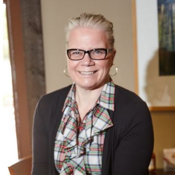 Jeanette Y. Martin presenting at the Women Entrepreneurs Speaker Event in Langley. Keynote speaker sharing insights on authentic visibility and communication.