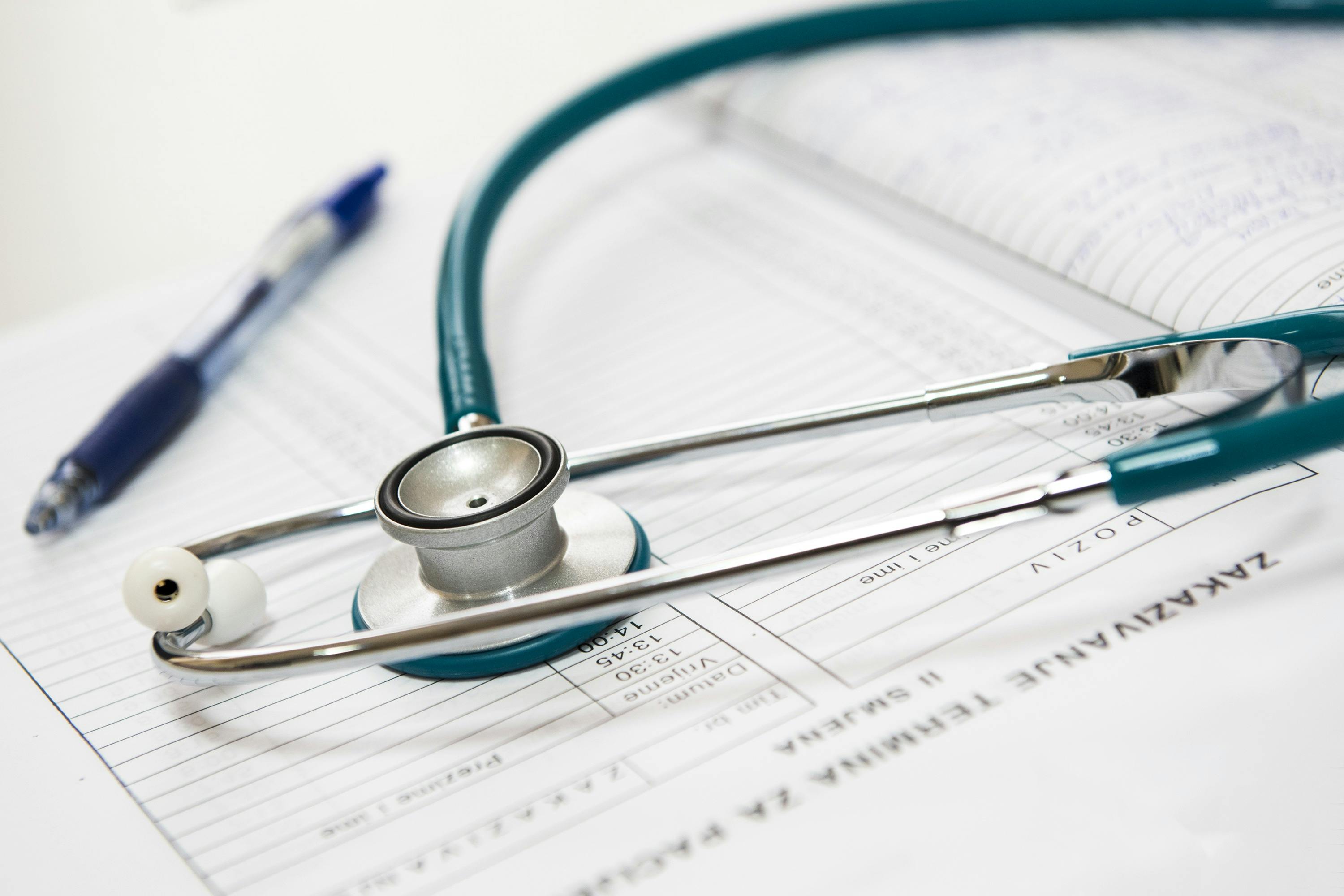 Stethoscope on medical charts – Second appointment includes lab review and customized hormone treatment plan at Hormone Treatment Centers in Overland Park, KS