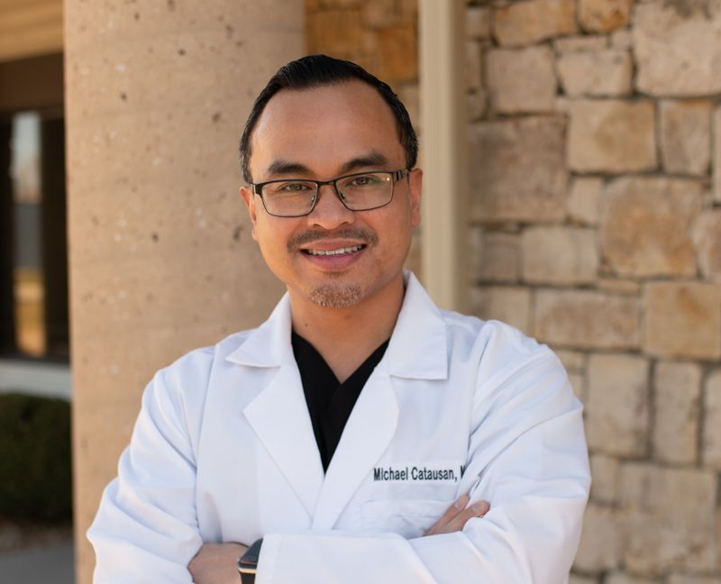Dr. Michael Catausan