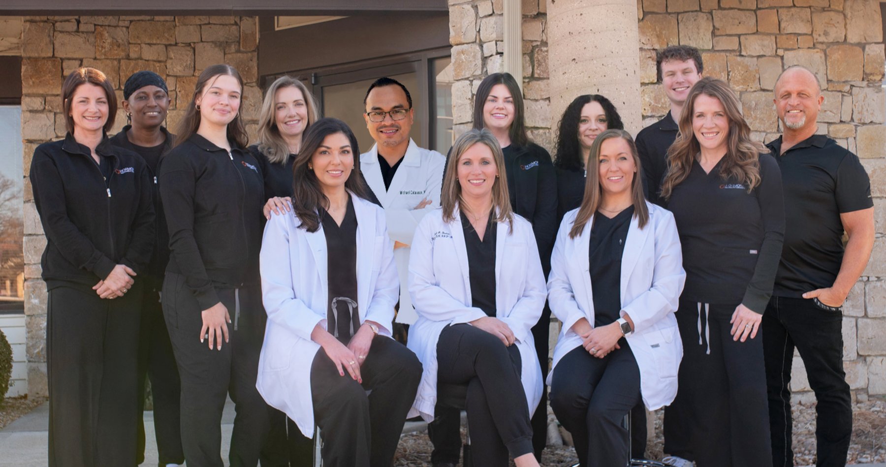 The Hormone Treatment Centers care team in front of the clinic