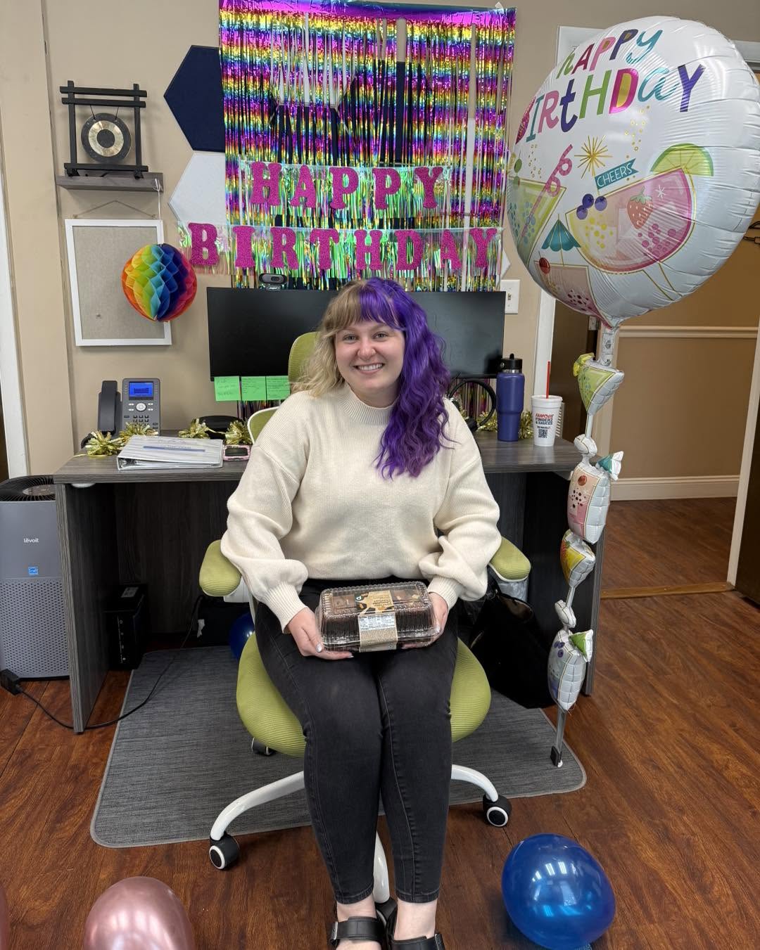 An in-office sales specialist at their desk