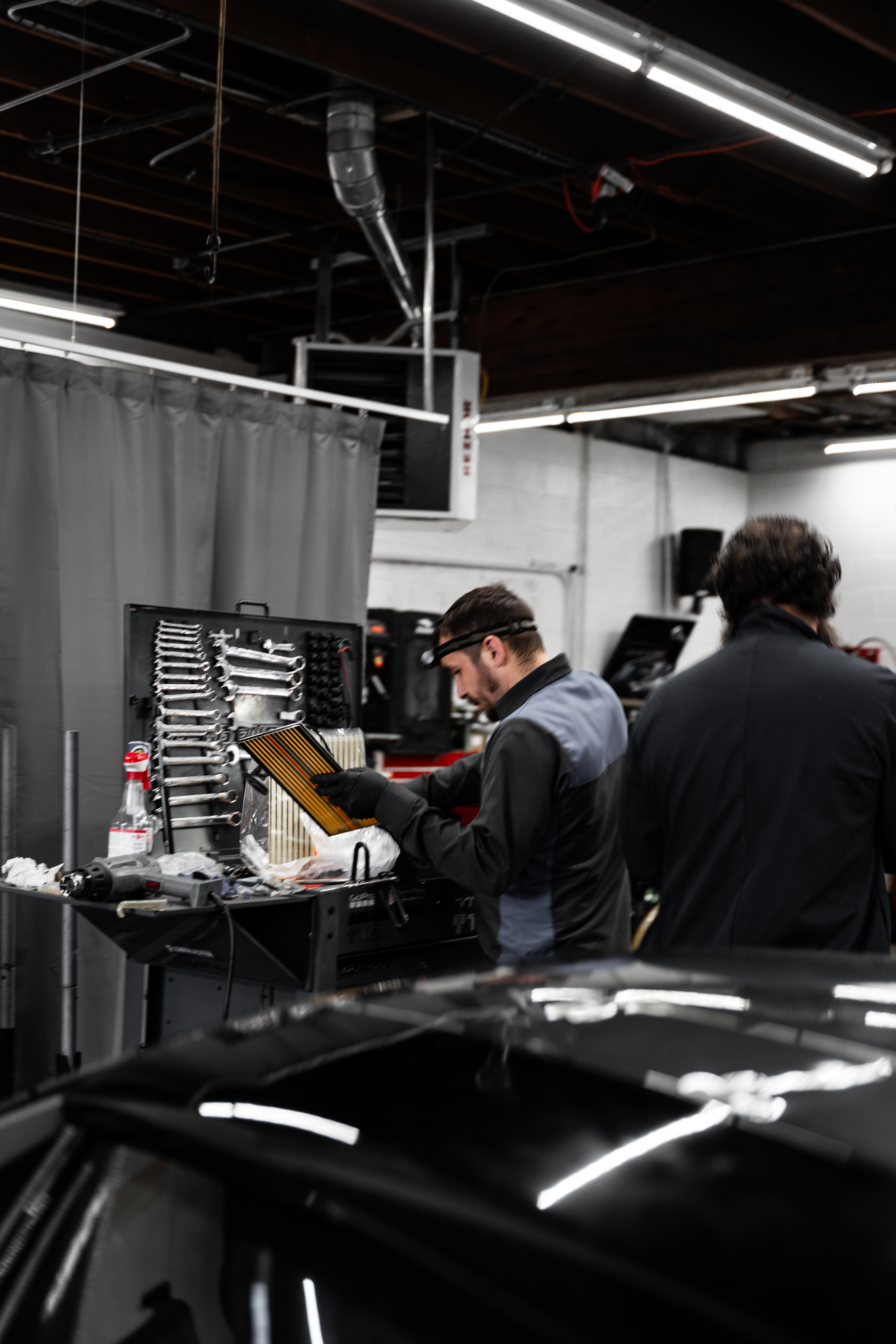 CarTech team working inside the Shoreline workshop