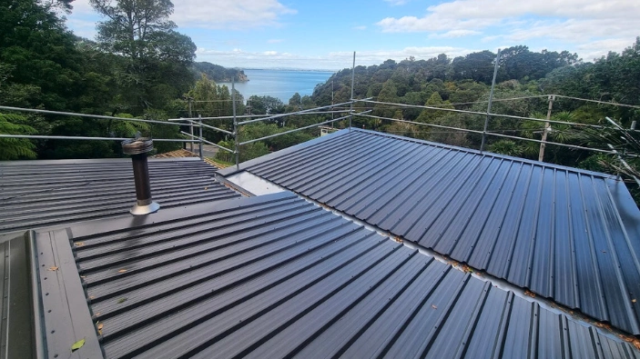 Full longrun iron roof replacement on Auckland property with new underlay and flashings