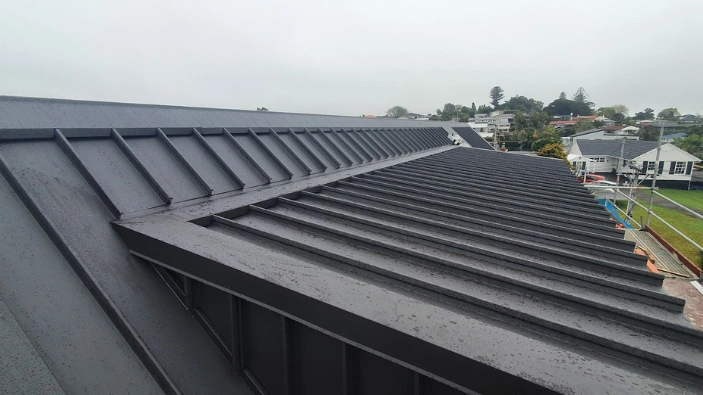 New long-run iron roof installation on Auckland residential property