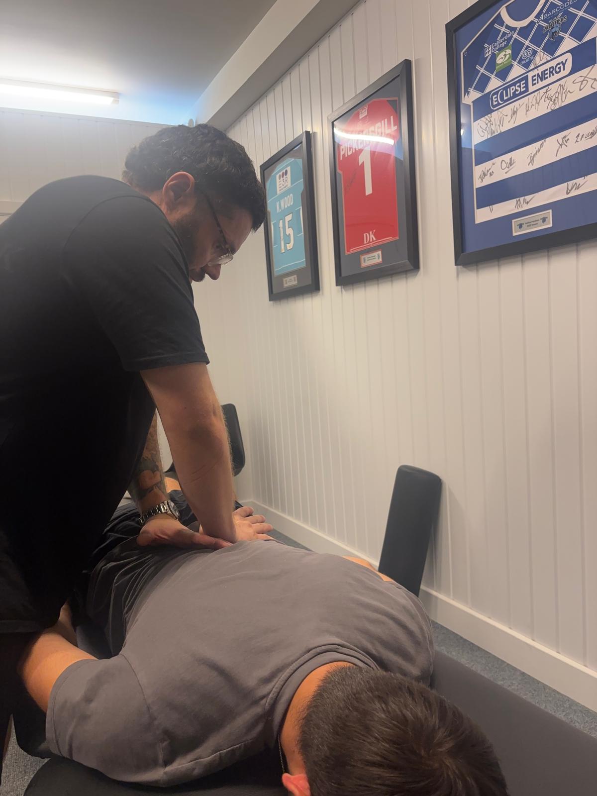 Valley Rehab therapist providing hands-on treatment during an assessment